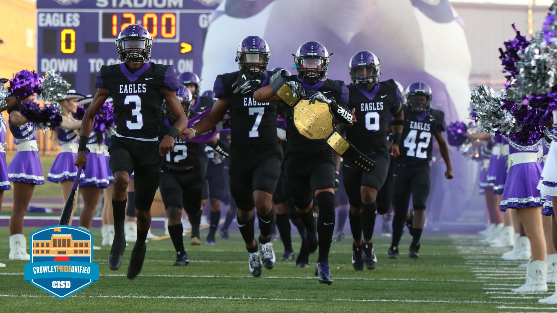 Crowley Football entering the field 