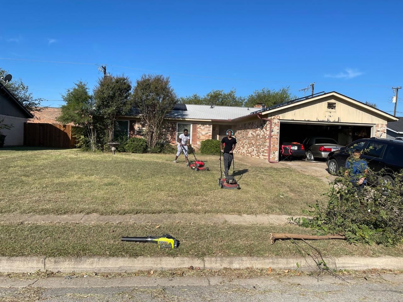 CHS students mowing lawn