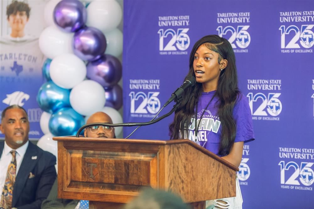  student speaking at podium