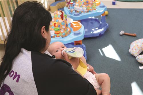 Baby Being Fed Bottle 