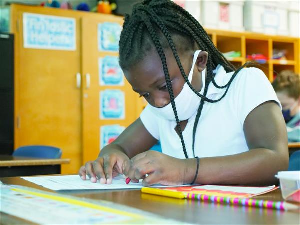 Sy'Mora Kindred doing homework