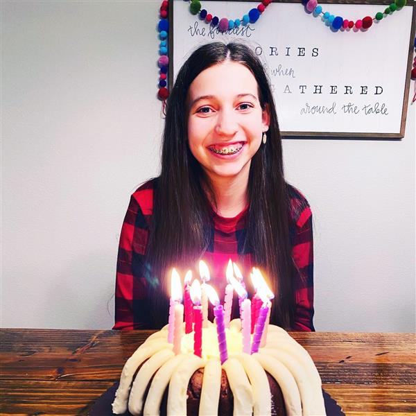 Ava Tinsley with cake