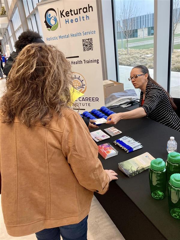 mental health symposium and resource fair table